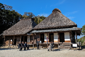 記念証を読み上げる田中市長